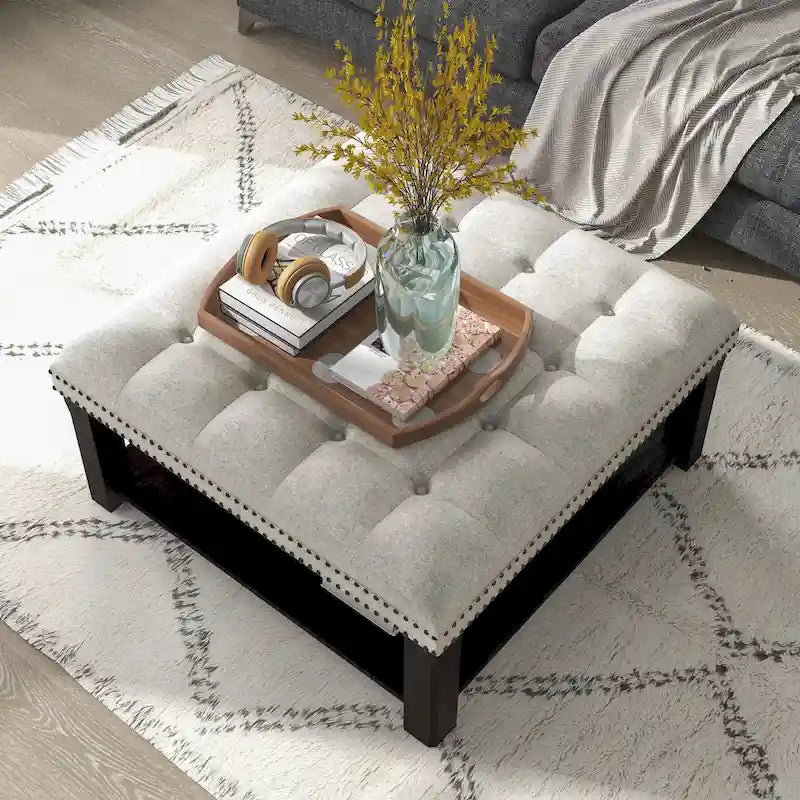 Pouf de salon capitonné en lin transitionnel avec rangement et clous décoratifs