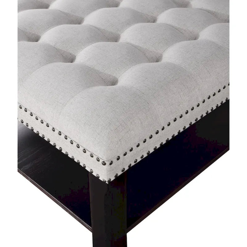 Pouf de salon capitonné en lin transitionnel avec rangement et clous décoratifs